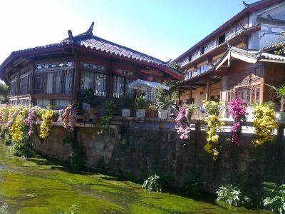 Sina Hotel Lijiang - Bild 3
